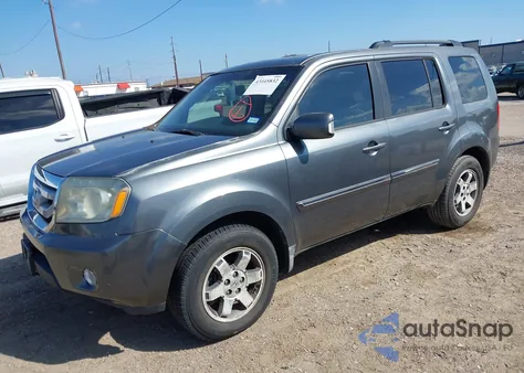 2010 Honda Pilot Touring z USA, uszkodzony, nr VIN 5FNYF3H95AB023041